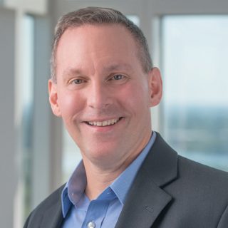总裁兼 CEO Phil Hess